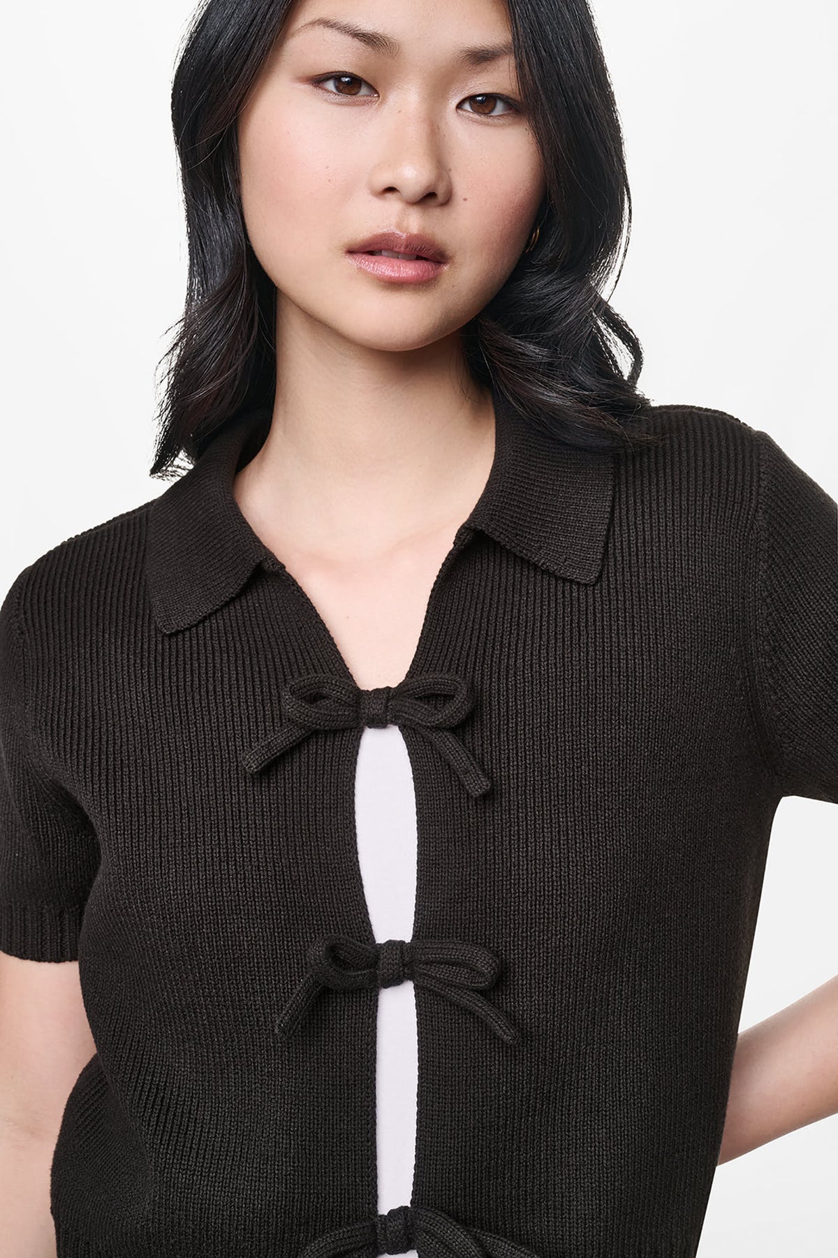 DKNY SHORT SLEEVE TIE FRONT POLO SWEATER